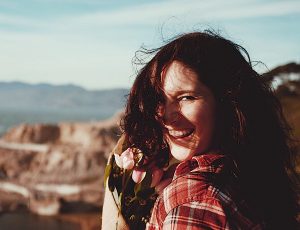 woman-at-coast-w-flowers